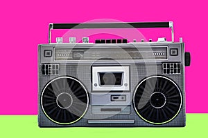 1980s Silver retro radio boom box on color background photo