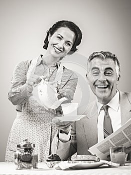 1950s style couple having breakfast