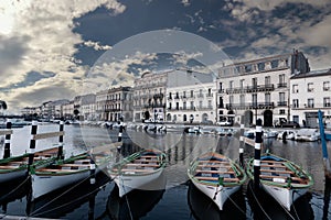 Canal de la Peyrade and its typical rowing boats, desaturated, in SÃ¨te in Occitanie, France photo