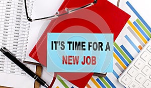 PAY IT FORWARD text on notebook with chart, calculator and pen