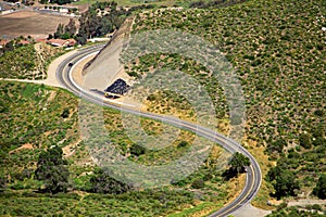 S-turn across a mountain road in the rural area