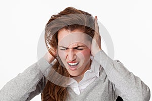 20s woman getting mad at tinnitus issue or loud music photo