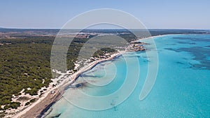 Sa Rapita, Mallorca Spain. Amazing drone aerial landscape of the charming Es Rapita beach and turquoise sea photo
