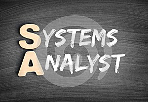 SA - Systems Analyst acronym, technology concept on blackboard