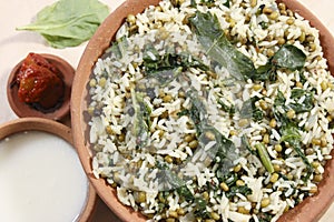 Saag waali Khichri it is an north Indian dish