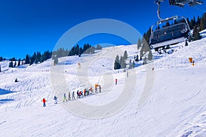 Saalbach, Austria ski slope and chair lift photo