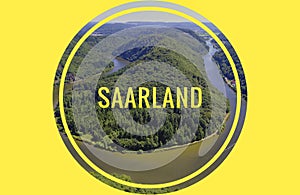 Saarschleife of the Saar near Orscholz with the inscription in yellow Saarland with a circle with a view of the entire Saarbiegung