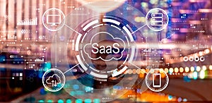 SaaS - software as a service concept with big city at night