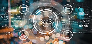 SaaS - software as a service concept with blurred city lights