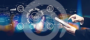 SaaS - software as a service concept with businessman using a tablet computer