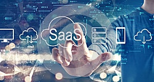 SaaS - software as a service concept with a man on city background