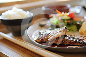 Saba fish teriyaki with rice soup and salad on wooden tray , Japanese food