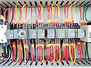 Selective focus image with noise effect a row various type of electrical relays.