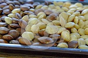 Sacha inchi peanuts or Inca seeds on a tray