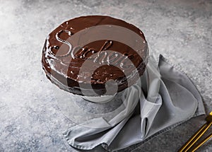 Sacher cake. Traditional Austrian chocolate dessert. Homemade baking. Selective focus, close-up