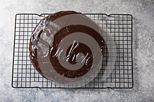 Sacher cake. Traditional Austrian chocolate dessert. Homemade baking. Selective focus, close-up