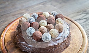 Sacher torte decorated with truffles