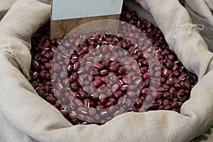 Sack with Azuki beans for sale on the market