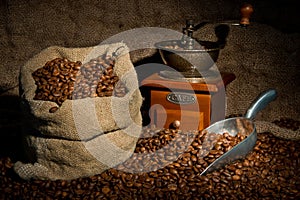 Sack of coffee beans, coffee grinder