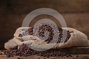 Sack of spilled roasted coffee beans