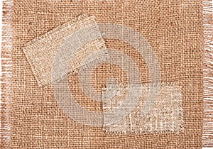 Sackcloth tags on sackcloth material