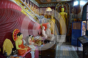 Sacral statues in the rock temple of the Isurumuniya Monastery, Anuradhapura, Sri Lanka