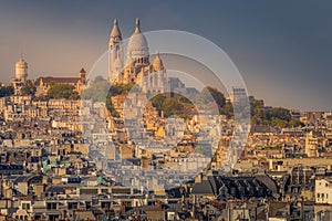 Sacre coeur basilica above Montmartre summit , Paris, France