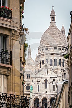 Sacre coeur basilica above Montmartre summit , Paris, France