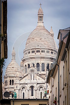 Sacre coeur basilica above Montmartre summit , Paris, France