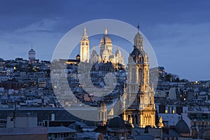 Sacre coeur, Montmartre and Sainte-TrinitÃÂ© at nightin Paris