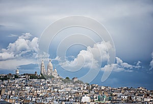 Sacre oeur cathedral in top of Montmatre hill in paris photo