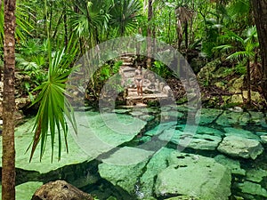 Sacred cenote azul in Tulum, Yucatan Peninsula, Mexico photo