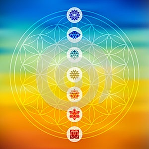 Sacred geometry with chakra icons colorful background