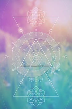 Sacred geometry symbol on colorful background.