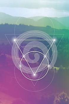 Sacred geometry symbol on colorful background.