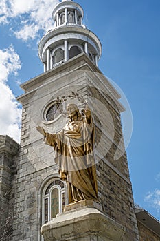 Sacred Heart of Jesus statue and steeple