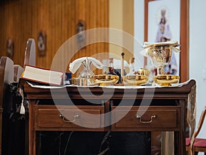 Sacred Liturgical Objects on Altar Table