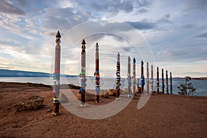 Sacred pillars with tied ribbons on Cape Burhan of Olkhon Island.