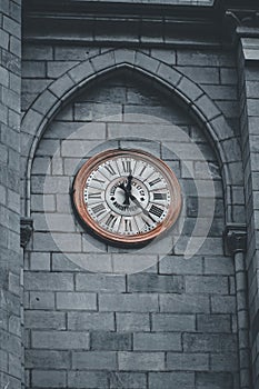 Sacred Spires: Medieval Church and Clock Tower in Lourdes Majesty