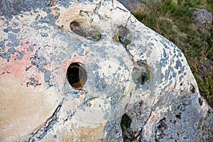 Sacred stones `Sledovik` and `Chashechnik` in the area of the village of Krasnogorye old name Vedmino