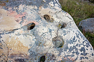 Sacred stones `Sledovik` and `Chashechnik` in the area of the village of Krasnogorye old name Vedmino