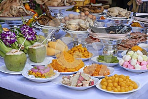 Sacrificial offering food for pray to god and memorial to ancestor, Bangkok, Thailand. Traditional offerings to gods with food,