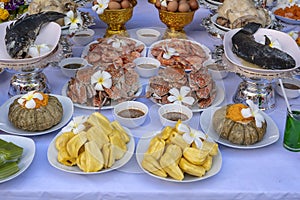 Sacrificial offering food for pray to god and memorial to ancestor, Bangkok, Thailand. Traditional offerings to gods with food,