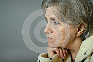 Sad aged woman