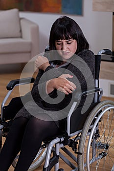 Sad and alone woman on wheelchair