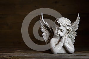 Sad angel: idea for a greeting or condolence card.