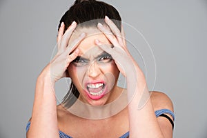 Sad and angry face. Emotional angry woman, upset girl. Screaming, hate, rage. Pensive woman feeling furious mad and