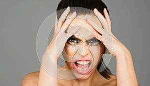 Sad and angry face. Emotional angry woman, upset girl. Screaming, hate, rage. Pensive woman feeling furious mad and
