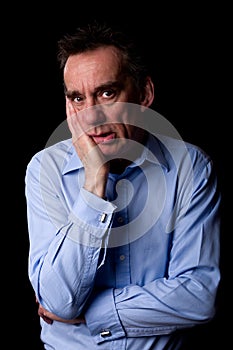 Sad Anxious Depressed Business Man with Hand to Chin