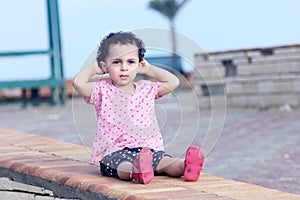 Sad arab baby girl